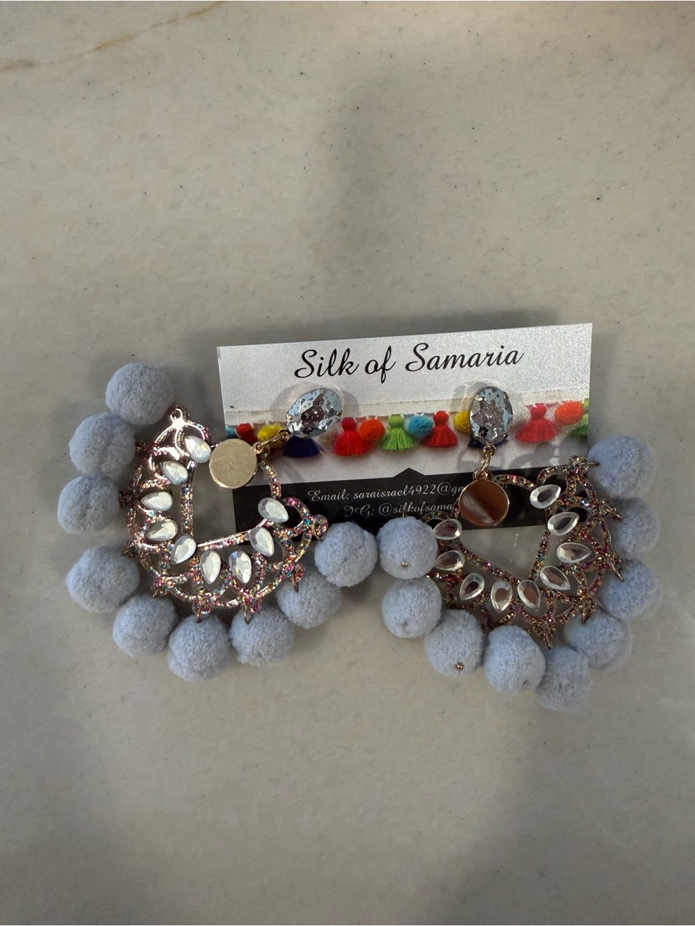 Silk of Samaria Light Blue Pom Pom Statement Earrings